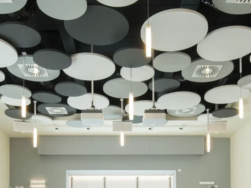Qianqiao Felt acoustic ceiling clouds installed in a conference room for enhanced sound control and modern interior design.