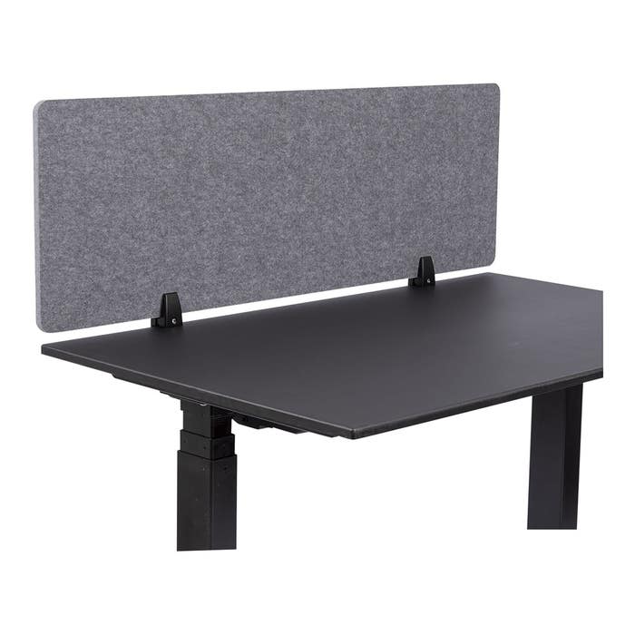 Clamp-on acoustic desk screen mounted on workstation